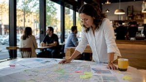 Urban planner reviewing Frisco growth maps
